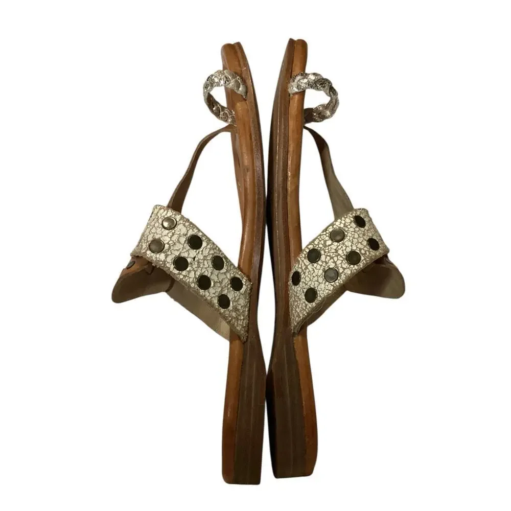 Frye tan leather sandals brass studs on the toe post. Size 8
